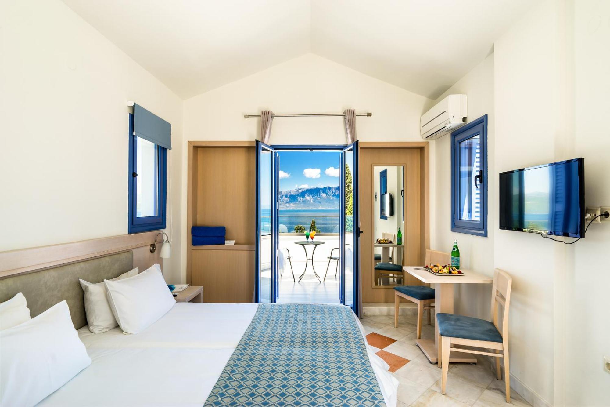 Porto Galini Seaside Resort & Spa ニキアナ エクステリア 写真 A typical room at the hotel