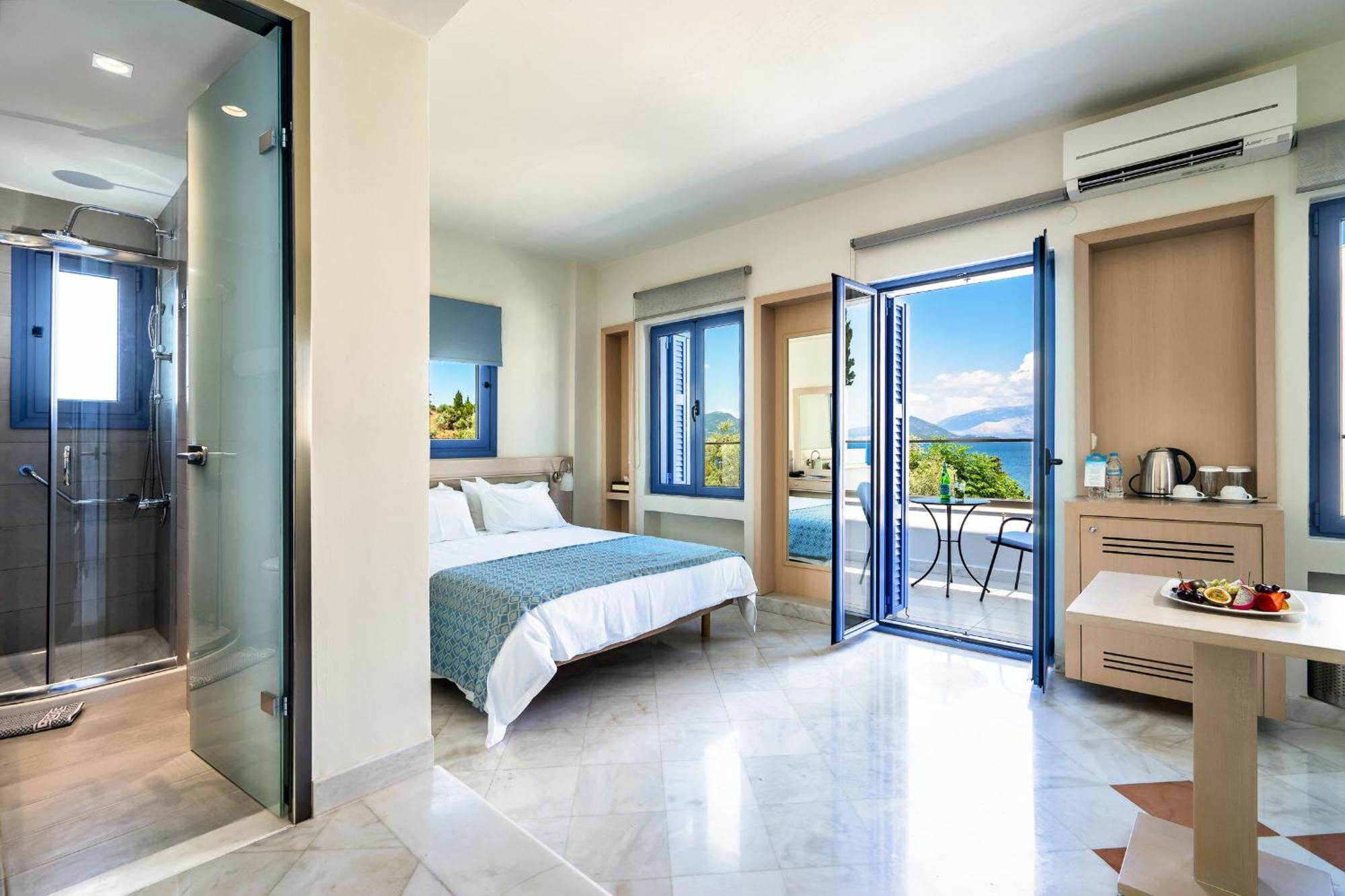 Porto Galini Seaside Resort & Spa ニキアナ エクステリア 写真 A typical room at the hotel
