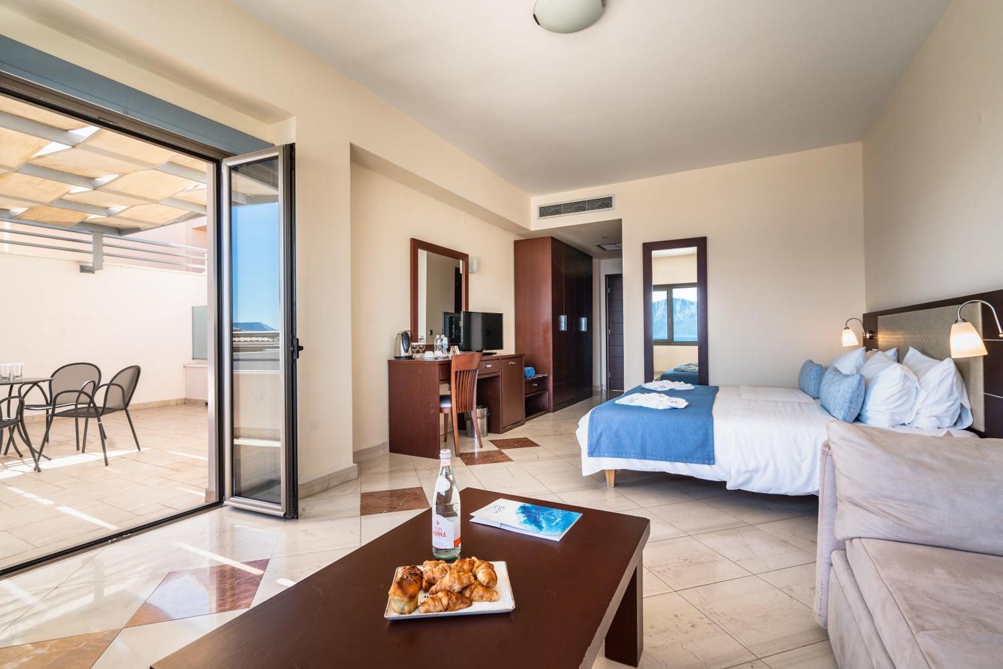 Porto Galini Seaside Resort & Spa ニキアナ エクステリア 写真 A typical hotel room