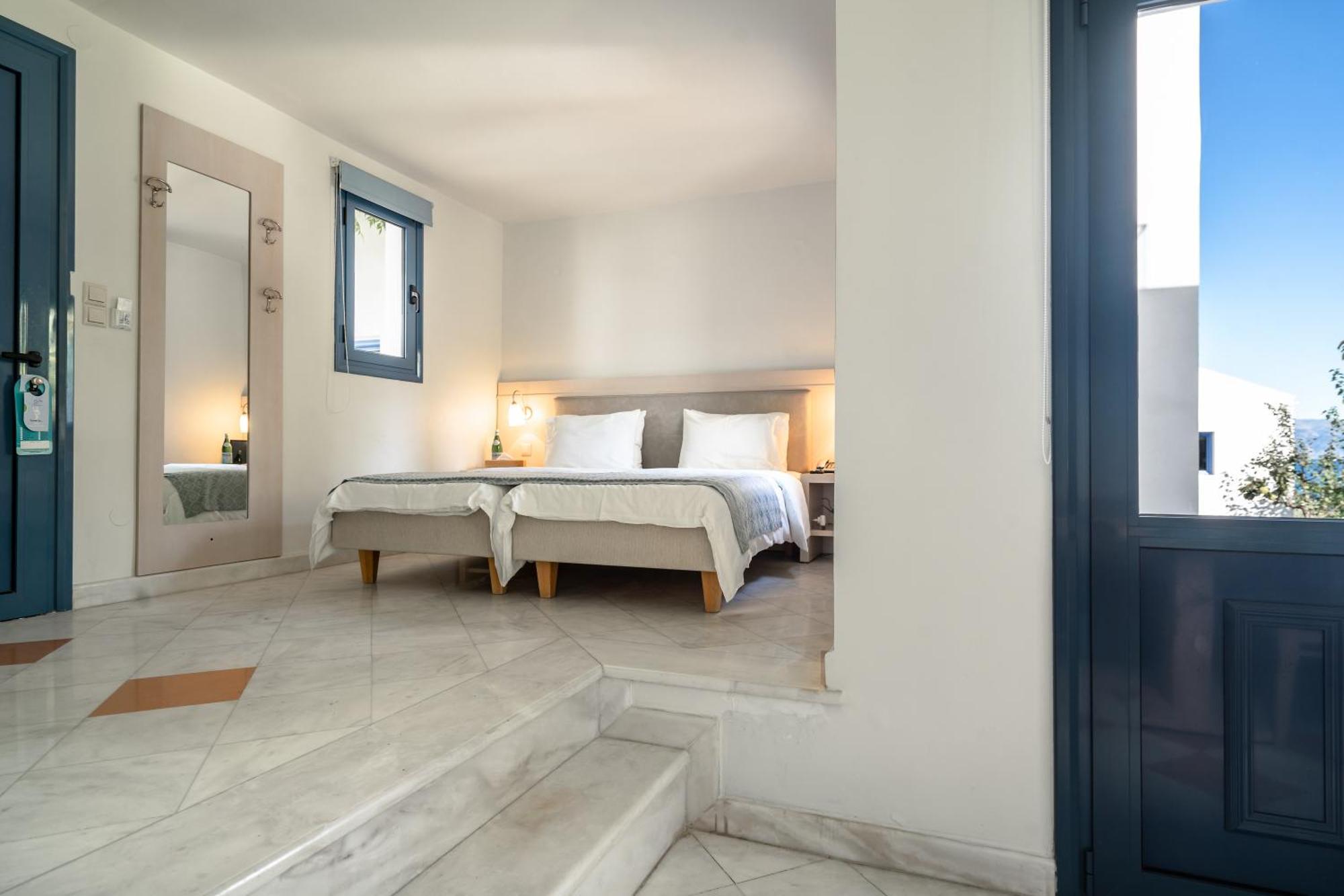 Porto Galini Seaside Resort & Spa ニキアナ エクステリア 写真 A bedroom at the hotel